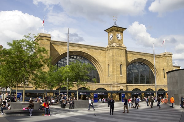 train station with people walking by