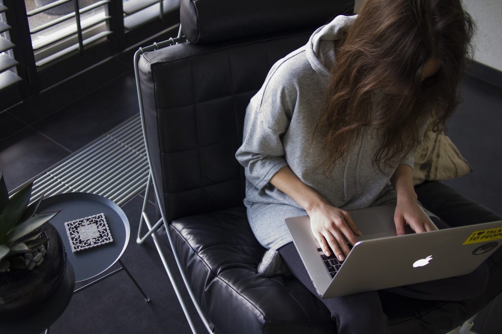 Woman working at home on her laptop