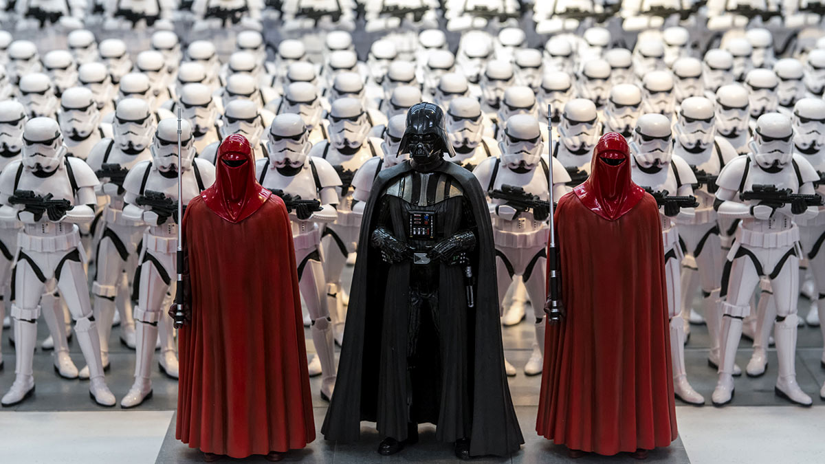 Figurines of Darth Vader and Storm Troopers from the Star Wars franchise